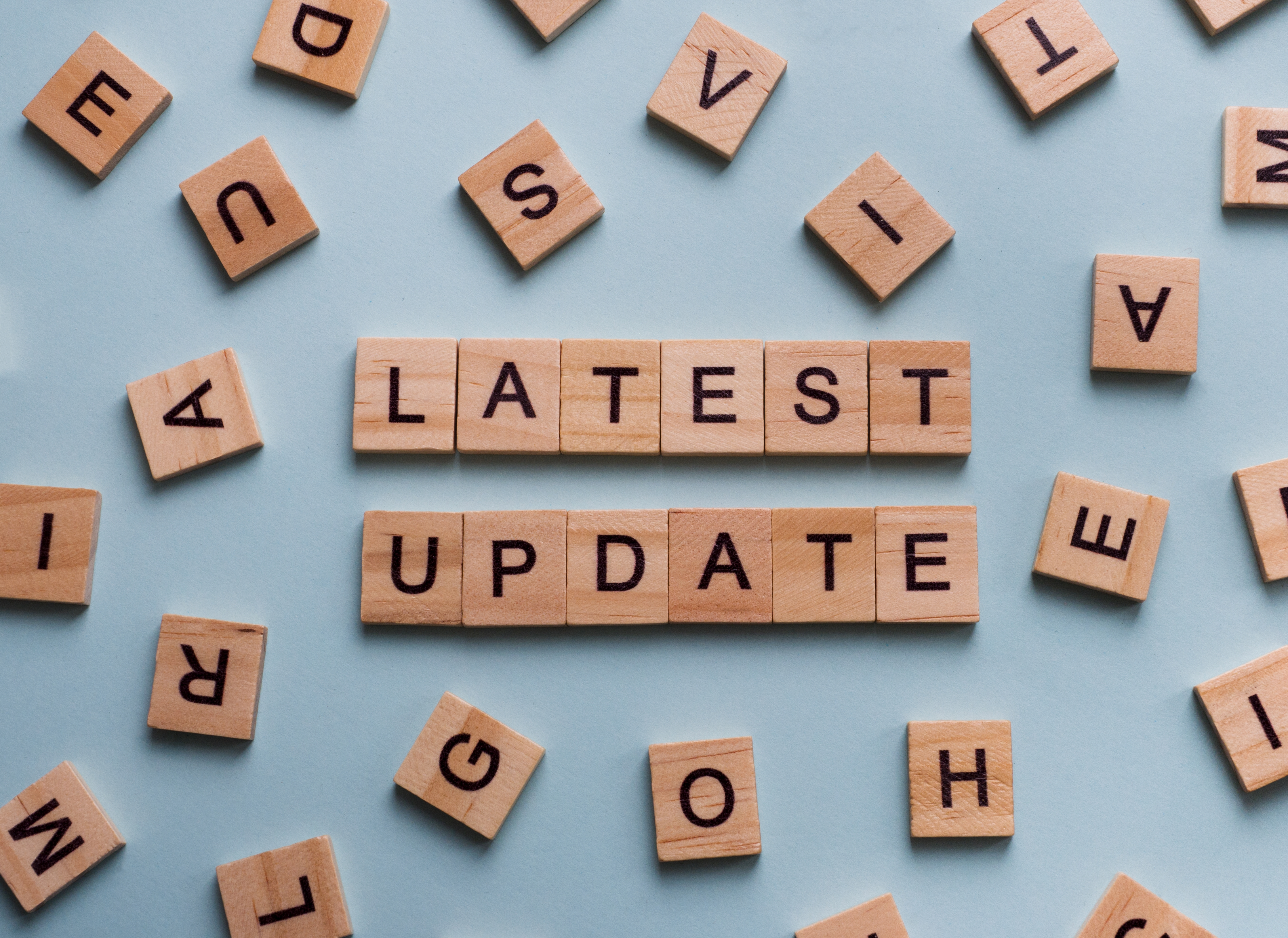 Wooden pieces saying latest update.